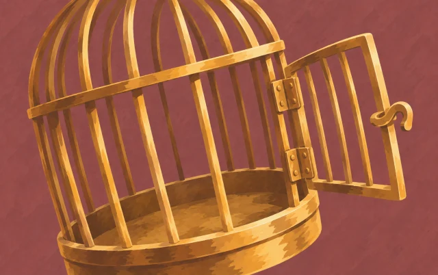 An empty birdcage is seen at an angle, showing its curved bars, door and hinges.